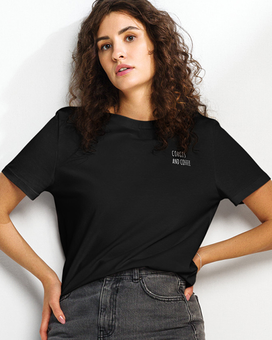 Model wearing a black tee that says Corgis and coffee