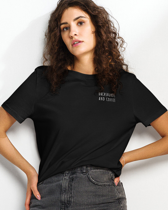 Model wearing a black tee that says Dachshunds and coffee